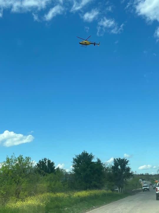 Travis County STARFlight helicopters responded to a crash near Bastrop/Caldwell Counties on Friday between a Hays Consolidated Independent School District school bus and a concrete truck | KXAN viewer photo