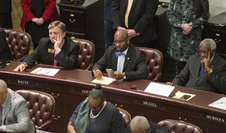 In this Tuesday, Jan. 10, 2017, photo, Arkansas state Rep. Fred Love, D-Little Rock, center, attends a joint session of the 91st General Assembly in Little Rock, Ark. Arkansas state offices are closed Monday, Jan. 16 in observance of the the shared birthdays of slain civil rights leader Martin Luther King Jr. and Confederate Gen. Robert E. Lee. Arkansas Republican Gov. Asa Hutchinson is reviving an effort to remove Lee from the holiday. But he faces resistance from opponents who complain the move belittles the state’s Confederate heritage and from black lawmakers worried about a plan to set aside another day to honor Lee. Love said he’s unlikely to support Hutchinson’s proposal if it includes a day for Lee. (AP Photo/Brian Chilson)