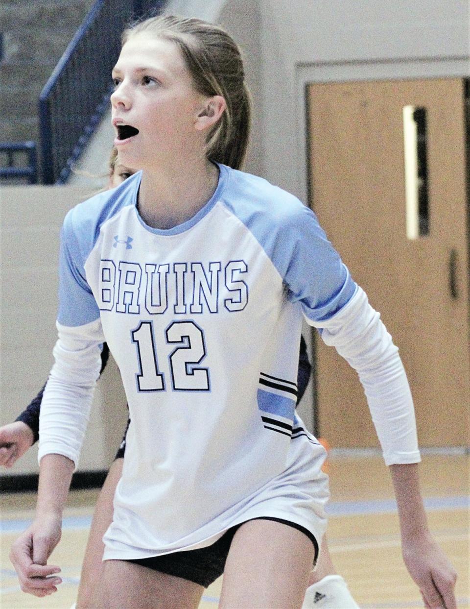 Emry Brown displays the emotion of a strong team effort last season for the Bartlesville High volleyball team.