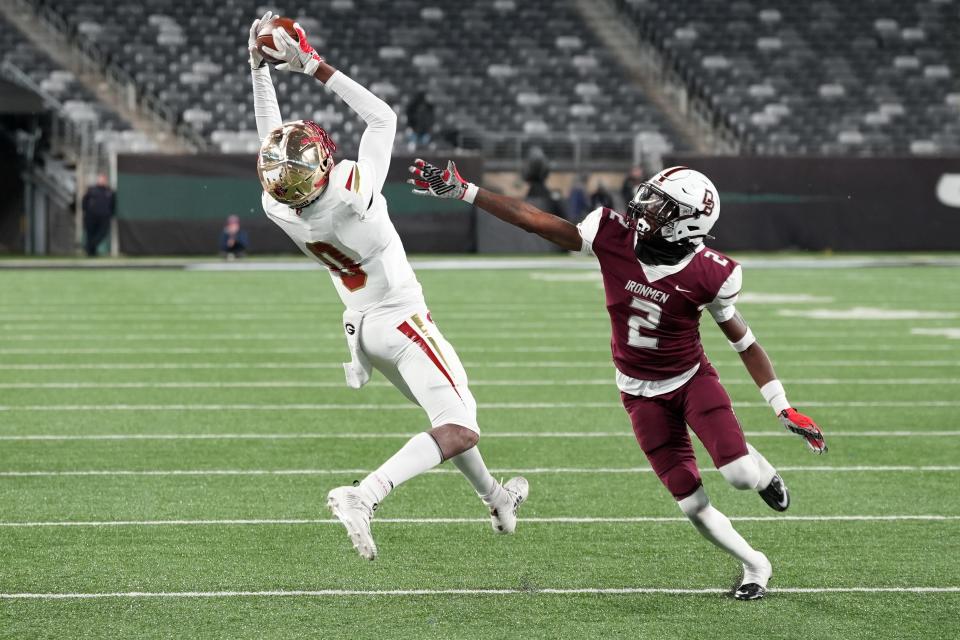 Don Bosco vs. Bergen Catholic in the Non-Public A football championship on Friday, November 25, 2022. BC #0 Quincy Porter makes a catch in the second quarter as DB #2 Sheaquan Walters tries to break up the pass. 