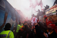 <p>Soccer Football – Champions League Quarter Final First Leg – Liverpool vs Manchester City – Anfield, Liverpool, Britain – April 4, 2018 Liverpool fans react as the Manchester City team bus approaches the stadium before the match Action Images via Reuters/Carl Recine </p>