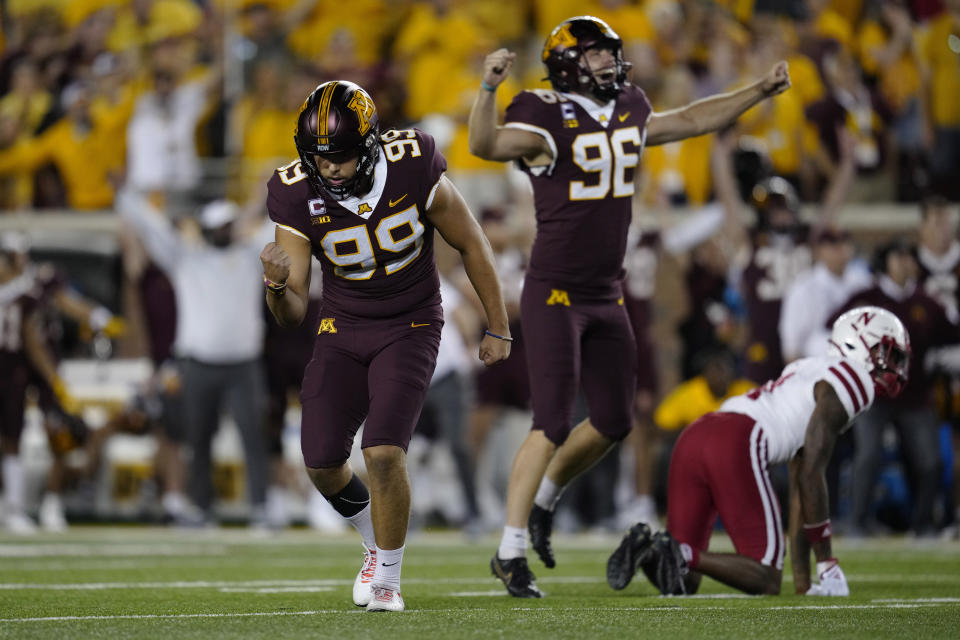 Minnesota place-kicker Dragan Kesich (99) celebrates after making a field goal on the final play to give Minnesota a 13-10 win over Nebraska in an NCAA college football game Thursday, Aug. 31, 2023, in Minneapolis. (AP Photo/Abbie Parr)