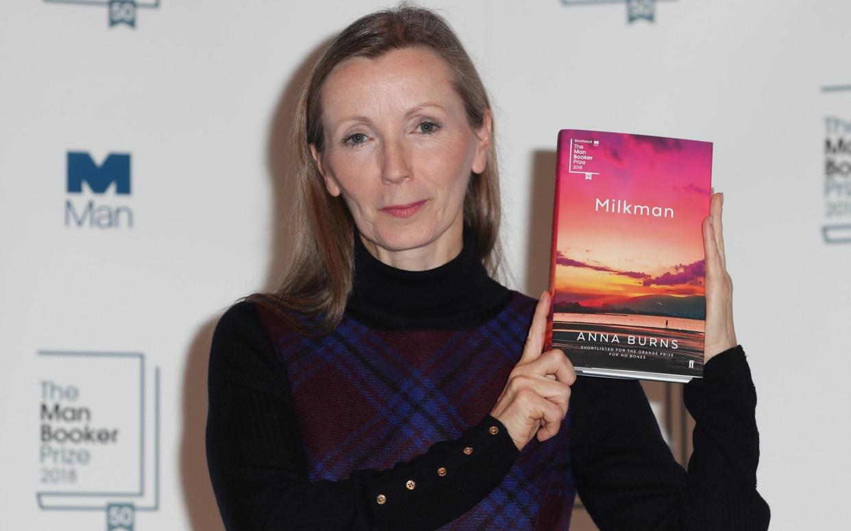 British author Anna Burns holds her book Milkman - AFP