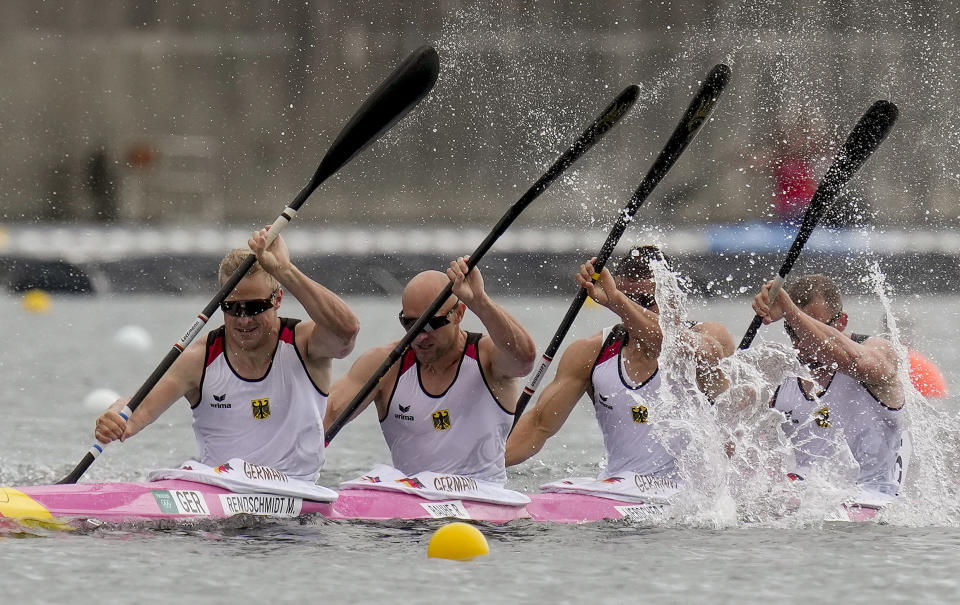 Max Rendschmidt, Ronald Rauhe, Tom Liebscher and Max Lemke of Germany compete in the men's kayak four 500m semifinal at the 2020 Summer Olympics, Saturday, Aug. 7, 2021, in Tokyo, Japan. (AP Photo/Kirsty Wigglesworth)