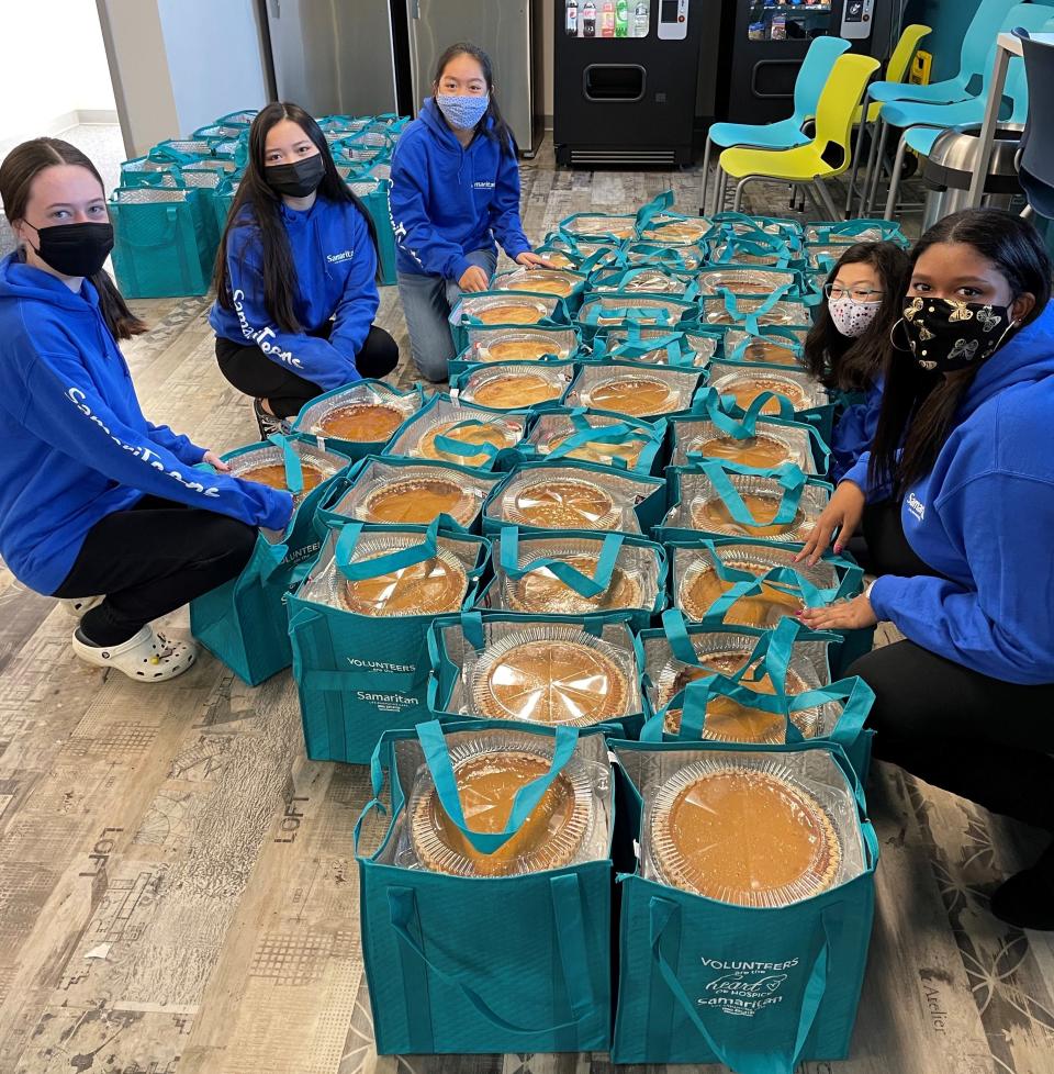 Members of Samaritan’s SamariTeens program McKenzie May (from left), Maddie McCann-Colvard, Isabella Cao, AJ McCann-Colvard and Chandler Nandkumar, helped continue the Samaritan tradition of delivering Thanksgiving meals to hospice families to allow them to spend time with loved ones rather than in the kitchen.