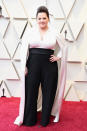 <p>The “Can You Ever Forgive Me?” actress wore a monochrome jumpsuit with cape for her first Oscars as a Best Actress nominee. <em>[Photo: Getty]</em> </p>