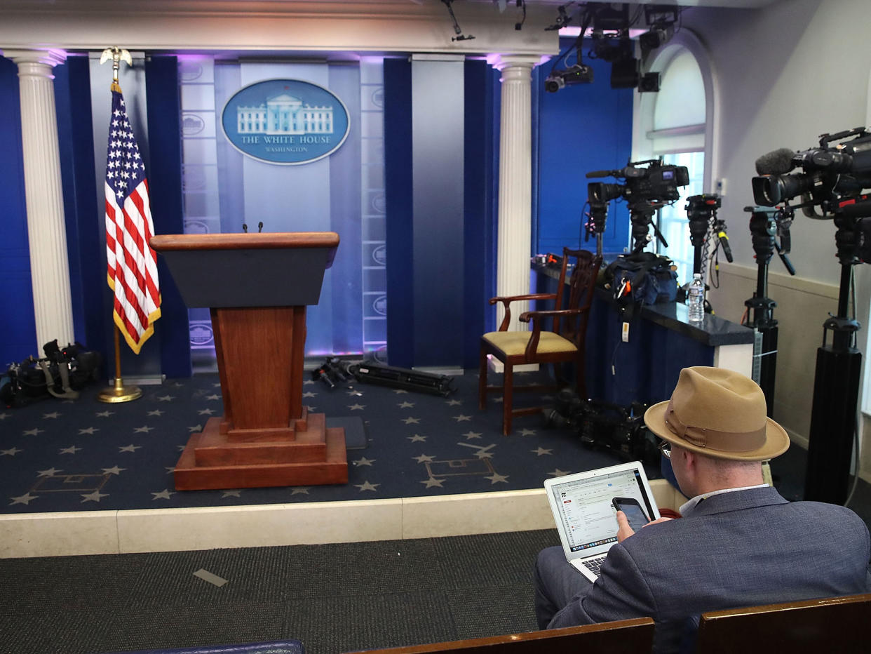 New York Times reporter, Glenn Thrush works in the Brady Briefing Room after being excluded from a press gaggle by White House Press Secretary Sean Spicer, on February 24, 2017 in Washington, DC: GETTY