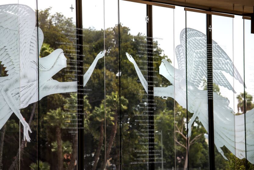 LOS ANGELES, CA - SEPTEMBER 09, 2019 - CATHEDRAL OF OUR LADY OF THE ANGELS, September 09, 2019. The area along the Angels windows, the candle offering and Virgin of Guadalupe altar is featured as one of the quiet places in the city to go. (Ricardo DeAratanha / Los Angeles Times)