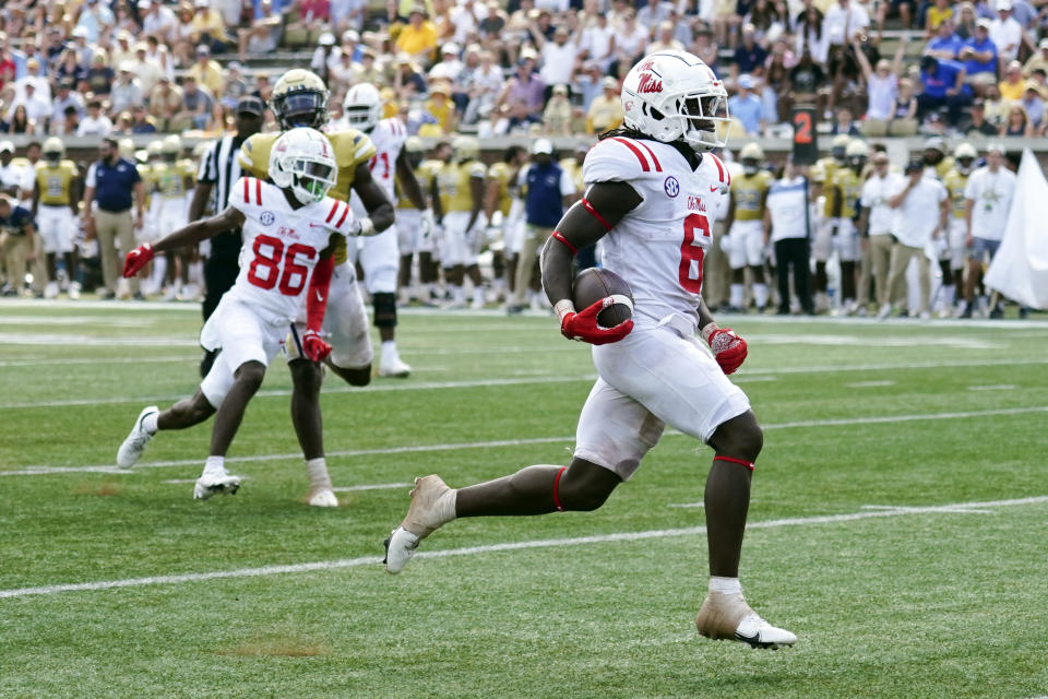 Mississippi running back Zach Evans (6) runs for a touchdown in the first half of an NCAA college football game against Georgia Tech, Saturday, Sept. 17, 2022, in Atlanta. (AP Photo/John Bazemore)