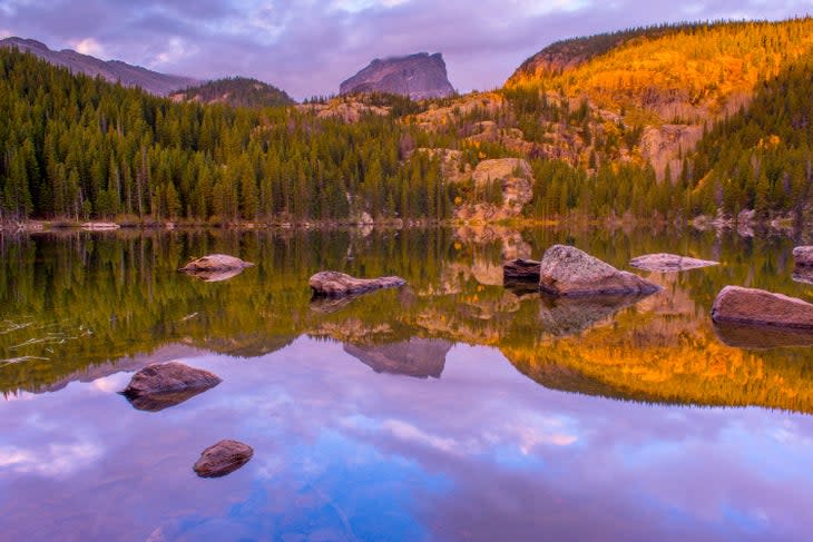 Reflection on Bear Lake at sunrise in Rocky Mountain National Park