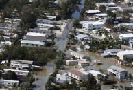 <p><strong>Key Largo</strong><br>Floodwaters cover streets in the aftermath of Hurricane Irma, Sept. 11, 2017, in Key Largo, Fla. (Photo: Wilfredo Lee/AP) </p>