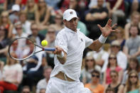 Britain Tennis - Wimbledon - All England Lawn Tennis & Croquet Club, Wimbledon, England - 3/7/16 USA’s John Isner in action against France’s Jo-Wilfried Tsonga REUTERS/Paul Childs