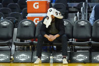 Injured Golden State Warriors guard Klay Thompson sits on the bench after the Warriors defeated the Portland Trail Blazers in an NBA basketball game in San Francisco, Friday, Nov. 26, 2021. (AP Photo/Jeff Chiu)