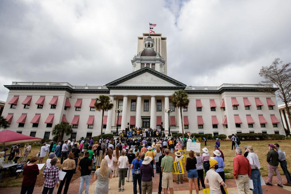 A large crowd gathers at the steps of the Historic Capitol as they rally for voting rights Thursday, Feb. 17, 2022.