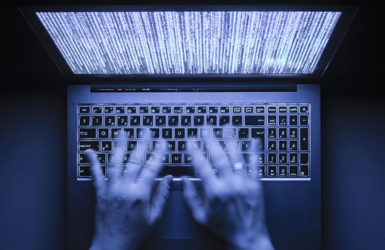 <span class="caption">Vulnerable devices and systems are targets.</span> <span class="attribution"><a class="link " href="https://www.gettyimages.com/detail/photo/illuminated-laptop-computer-in-the-dark-royalty-free-image/521369998?adppopup=true" rel="nofollow noopener" target="_blank" data-ylk="slk:EThamPhoto/Getty Images;elm:context_link;itc:0;sec:content-canvas">EThamPhoto/Getty Images</a></span>