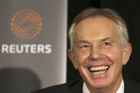 Former British Prime Minister Tony Blair smiles as Reuters Editor-at-Large Sir Harold Evans (not pictured) moderates a Reuters Newsmaker conversation "Politics on the Edge," in Manhattan, New York, U.S., September 20, 2016. REUTERS/Bria Webb