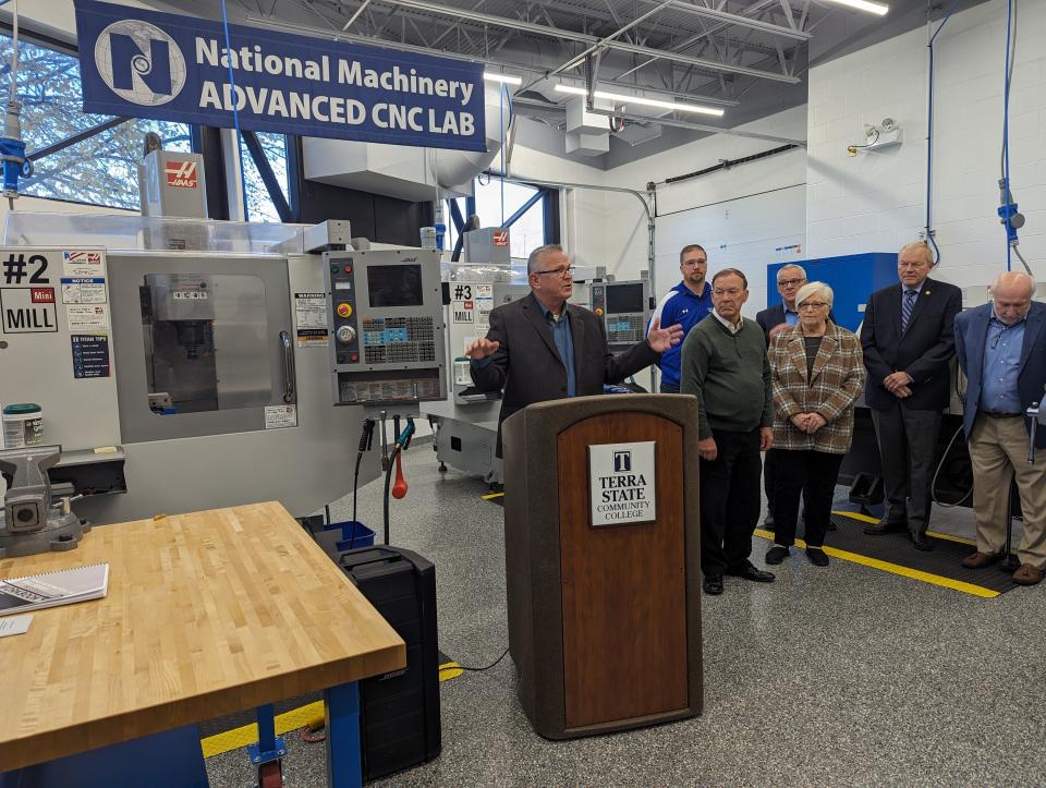 President Ronald Schumacher of Terra State Community College thanks National Machinery CEO Andrew Kalnow for the donation that helped create the college's new CNC Lab.