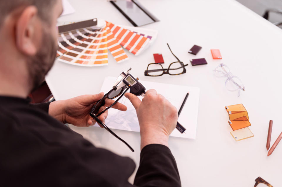 Finishing touches. <p>Photo: Giovanni Samarin/Courtesy of Thélios</p>