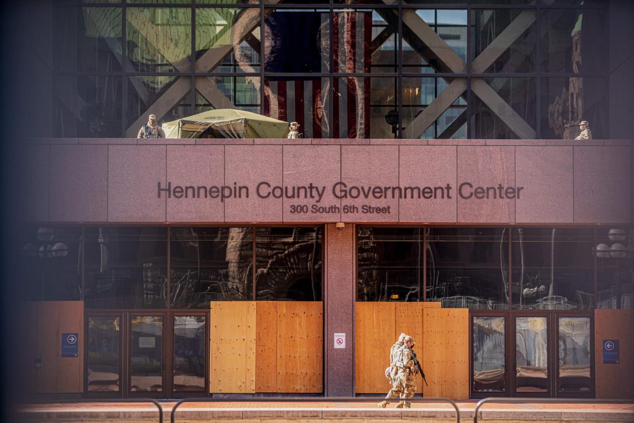 Minnesota National Guards patrol outside the Hennepin County Government Center during the opening statement of former Minneapolis Police Officer Derek Chauvin on March 29 in Minneapolis, Minnesota. (Photo: KEREM YUCEL/AFP via Getty Images)