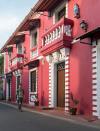 Fontainhas, the Latin Quarter of Panji, India, showcases the influence of Portuguese colonizers on the area. Brightly-colored, Portuguese-style houses sit along the cobblestone streets, and many showcase blue-and-white-tile street markers.