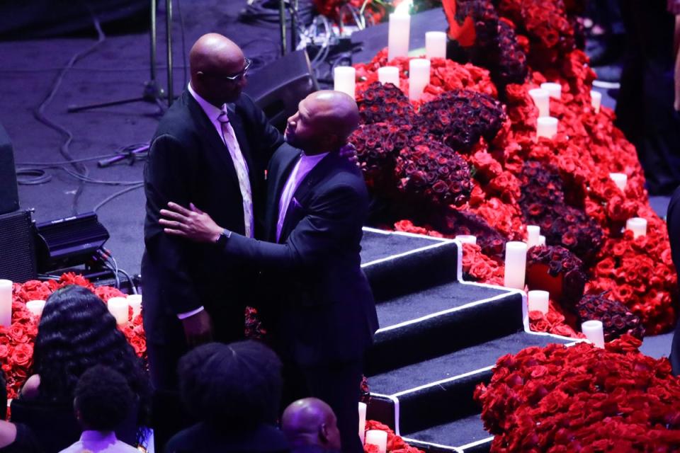 Joe Bryant and former Los Angeles Lakers' Derek Fisher arrive for a celebration of life for Kobe Bryant and his daughter Gianna in February 2020 (AP)