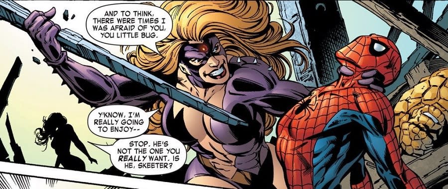 Titania holds a large dagger to Spider-Man's chest.