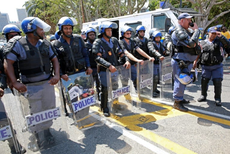 South African police in anti-riot gear in Cape Town on February 11, 2016