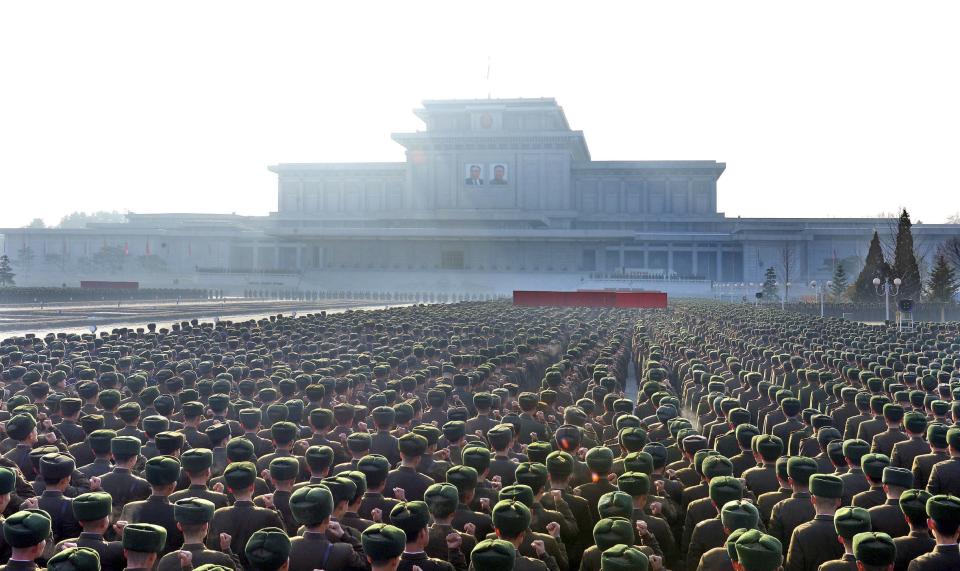 North Korean People's Army soldiers take part in a rally to swear allegiance to North Korean leader Kim Jong Un ahead of the second death anniversary of former leader Kim Jong Il at the Kumsusan Palace of the Sun