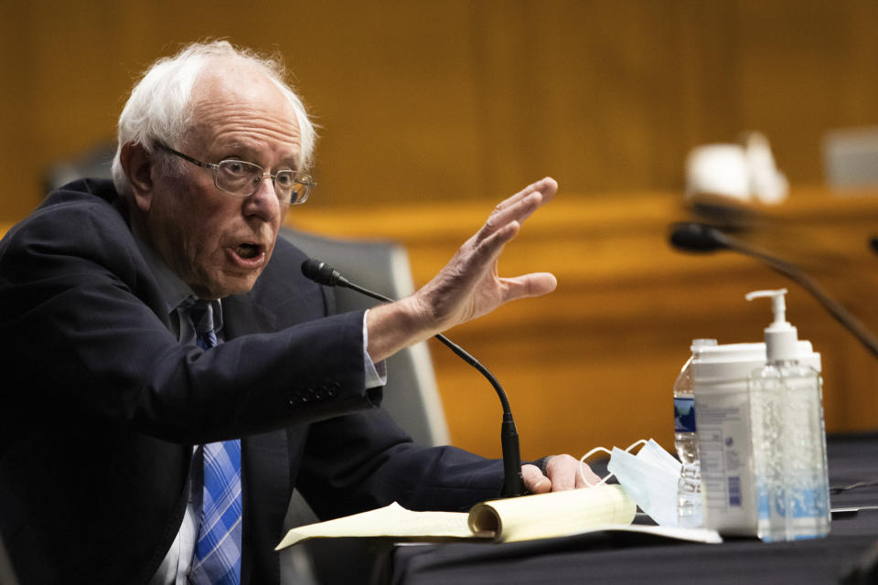 Sen. Bernie Sanders, D-Vt., questions former Gov. Jennifer Granholm, D-Mich., as she testifies before the Senate Energy and Natural Resources Committee during a hearing to examine her nomination to be Secretary of Energy, Wednesday, Jan. 27, 2021 on Capitol Hill in Washington. (Graeme Jennings/Pool via AP)