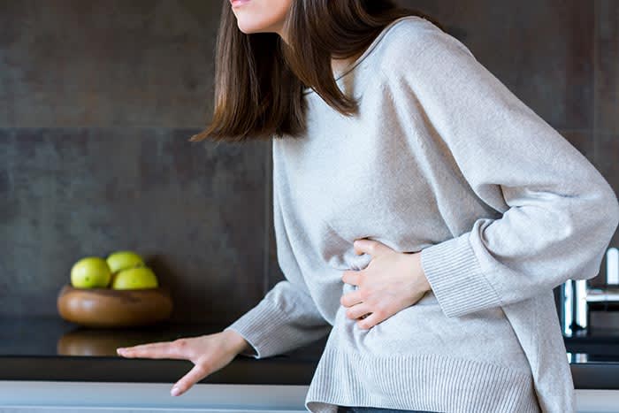 mujer con dolor