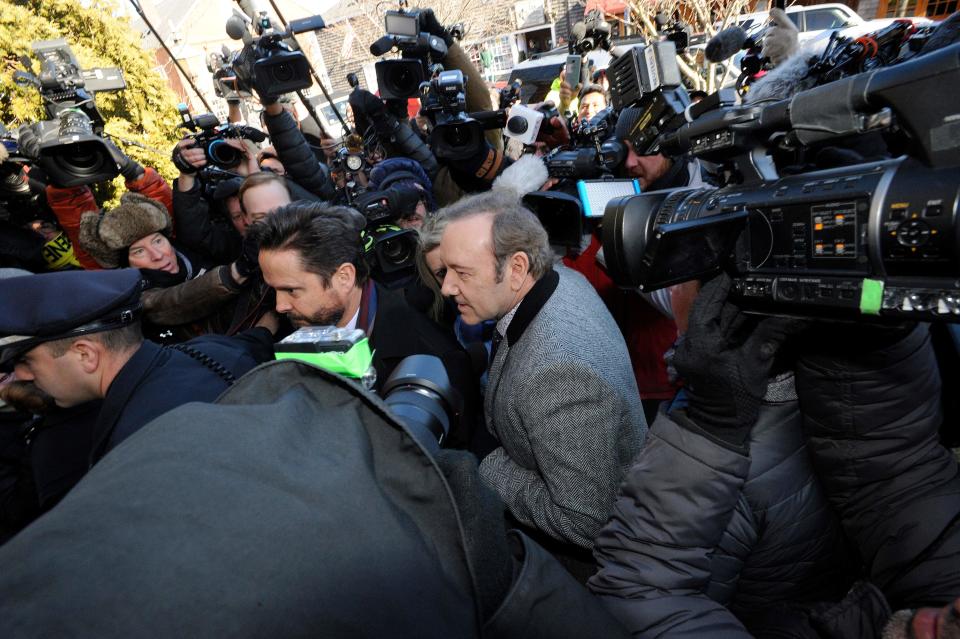 Kevin Spacey and his lawyer Alan Jackson wade through a media frenzy for his arraignment on Jan. 7, 2019 at the Nantucket District Court, on Nantucket, Mass.