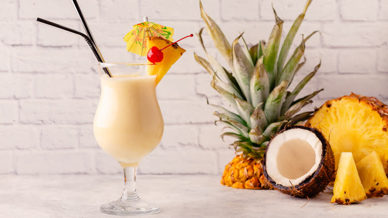 pina colada cocktail and fruit