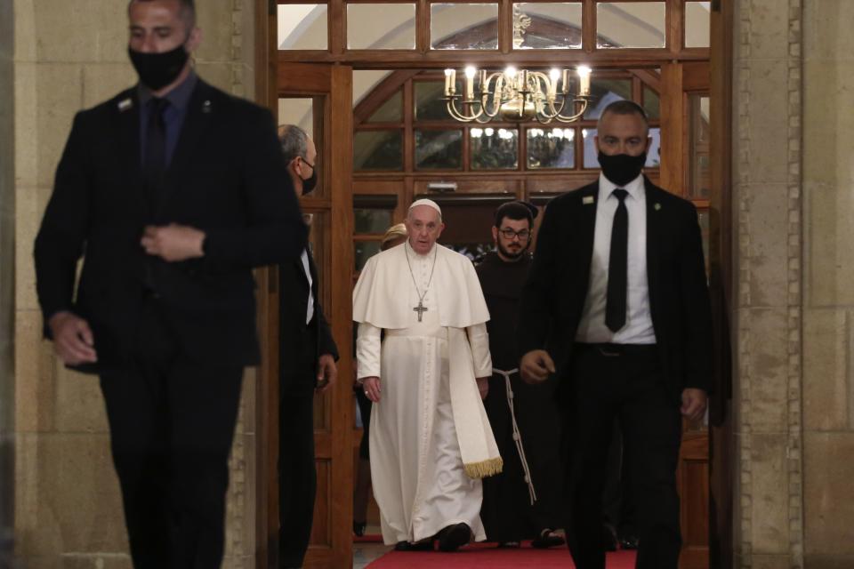 Pope Francis leaves the Presidential Palace in Nicosia, Cyprus, Thursday, Dec. 2, 2021. Pope Francis arrived in Cyprus on Thursday to draw attention to the plight of migrants on Europe's borders and the disconnect between his Gospel-driven call for countries to welcome and integrate them and front-line governments that are increasingly unwilling or unable to let them in. (AP Photo/Philippos Christou)