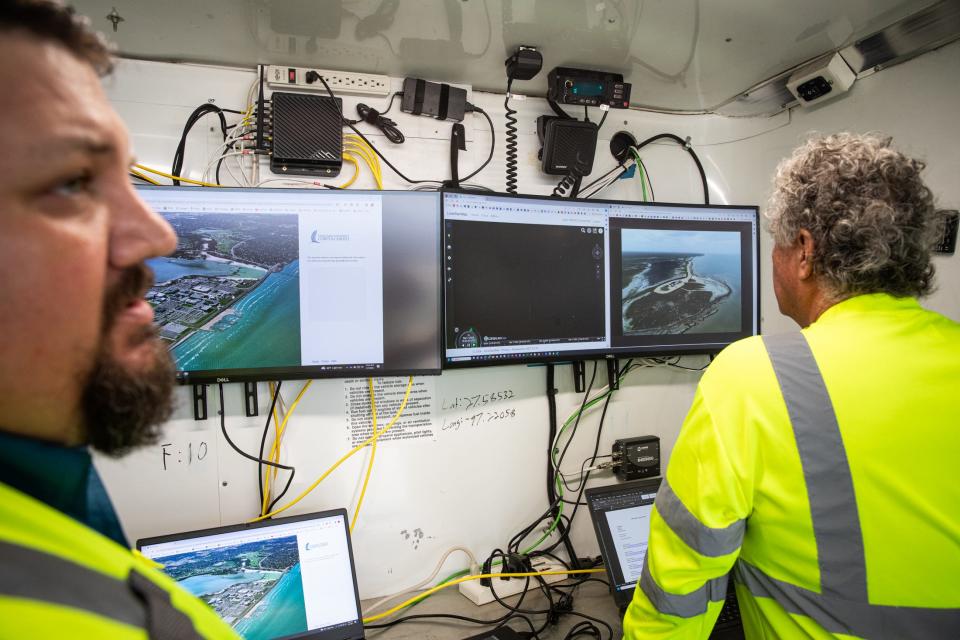 Tye Payne and Kenny Roberts, with Texas A&M Corpus Christi's Lone Star UAS, watch a video feed streaming from a drone at Padre Island National Seashore on Thursday, March 7, 2024.