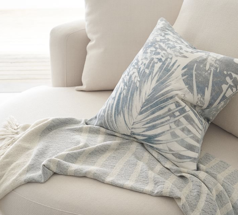 7) Eco-Friendly Striped Throw