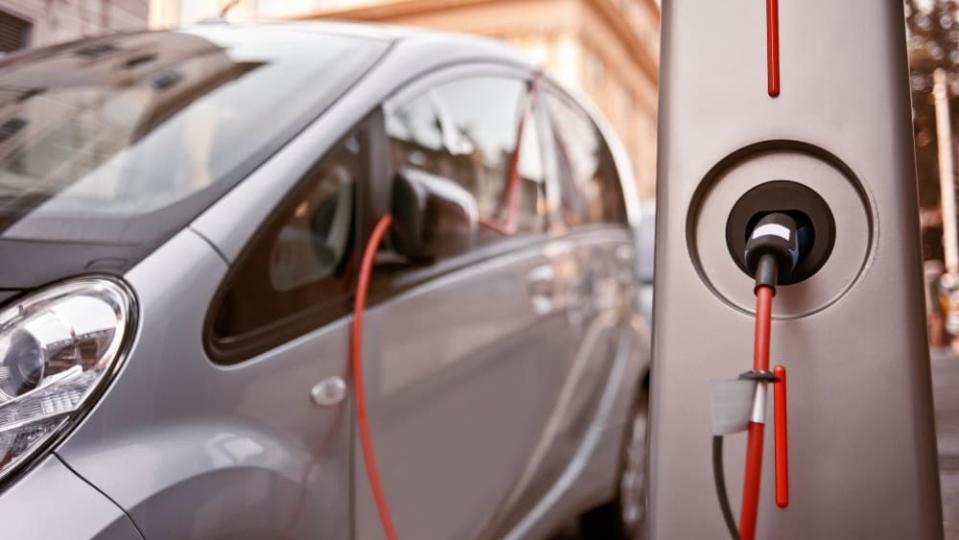 Electric car being charged