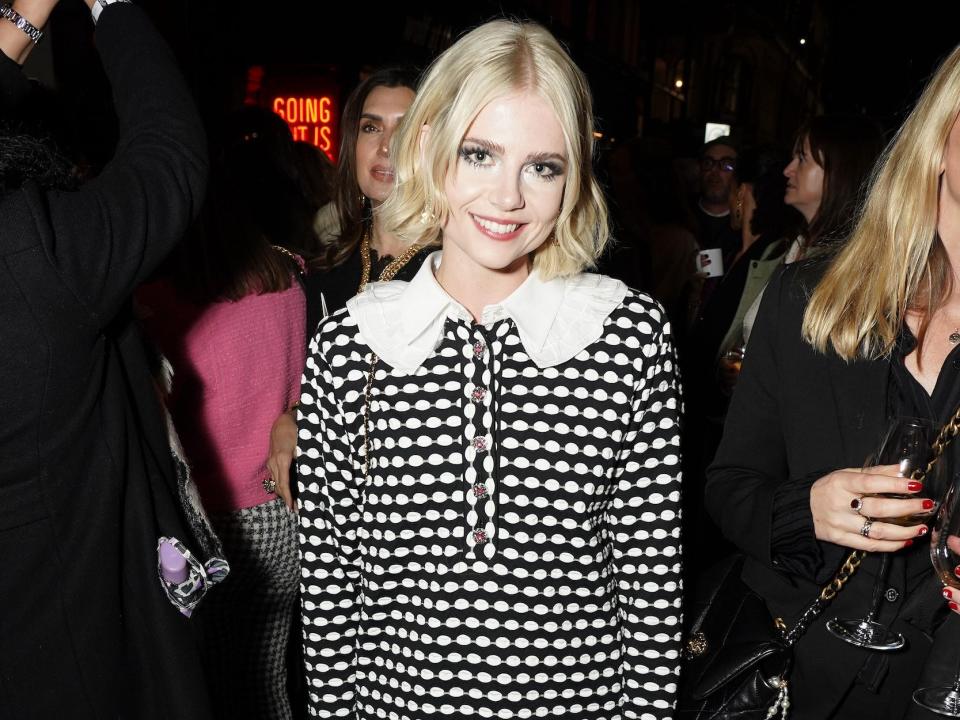 Lucy Boynton attends the Chanel Metiers D'Art Show on December 07, 2023 in Manchester, England.