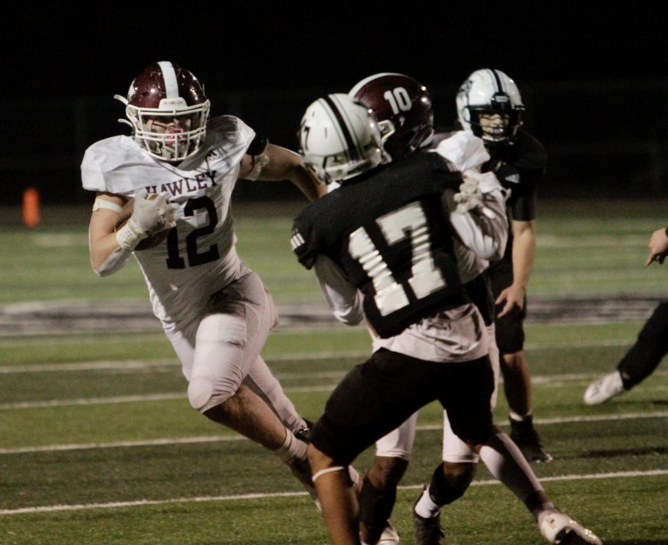 Hawley running back Austin Cumpton runs toward the outside against Forsan on Friday, Nov. 5. Even after missing a few games with an MCL injury, Cumpton has run for 17 touchdowns.