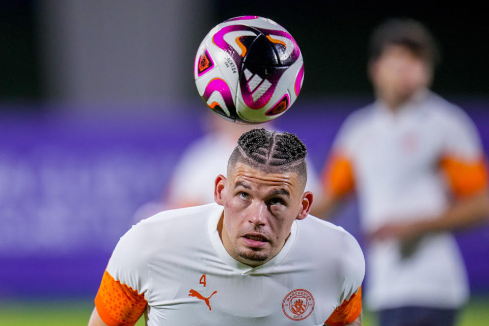 Manchester City's Kalvin Phillips heads the ball during a training session at the King Abdullah Sports City Stadium in Jeddah, Saudi Arabia, Monday, Dec. 18, 2023. Urawa Reds will play against Manchester City during the semifinal soccer match during the Club World Cup on Tuesday Dec. 19. (AP Photo/Manu Fernandez)