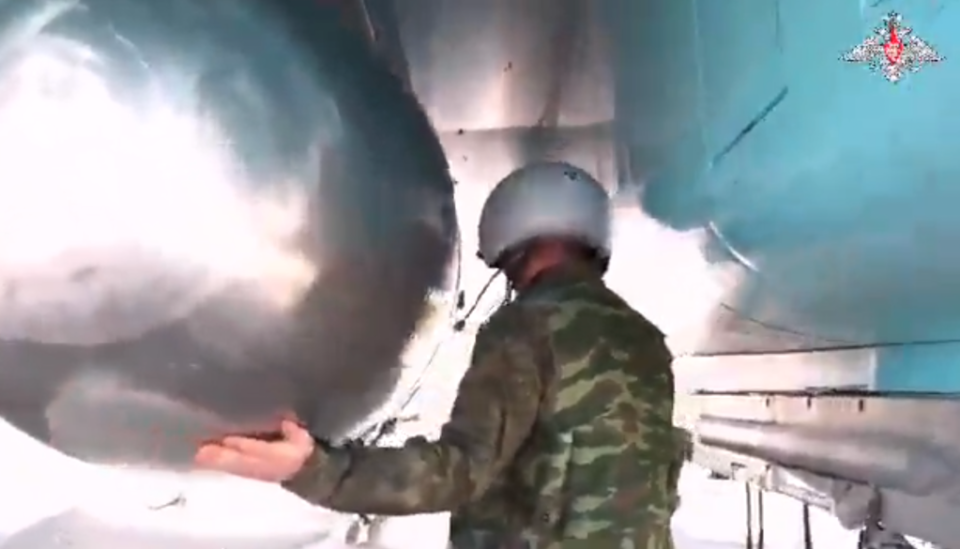 Pre-flight checks of the bomb mounted under a Su-34 of the Russian Aerospace Forces. <em>Russian MoD</em>