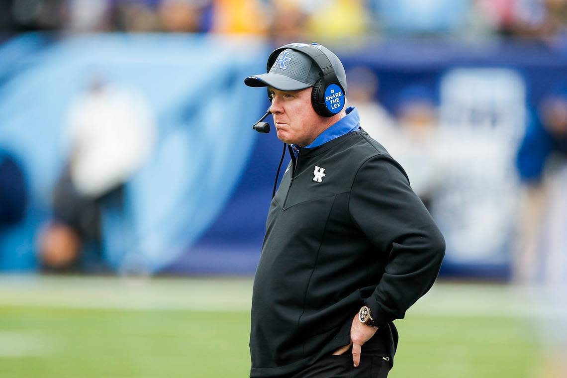 Kentucky Coach Mark Stoops watches the Wildcats get blanked 21-0 by Iowa before a smallish crowd in the Music City Bowl.