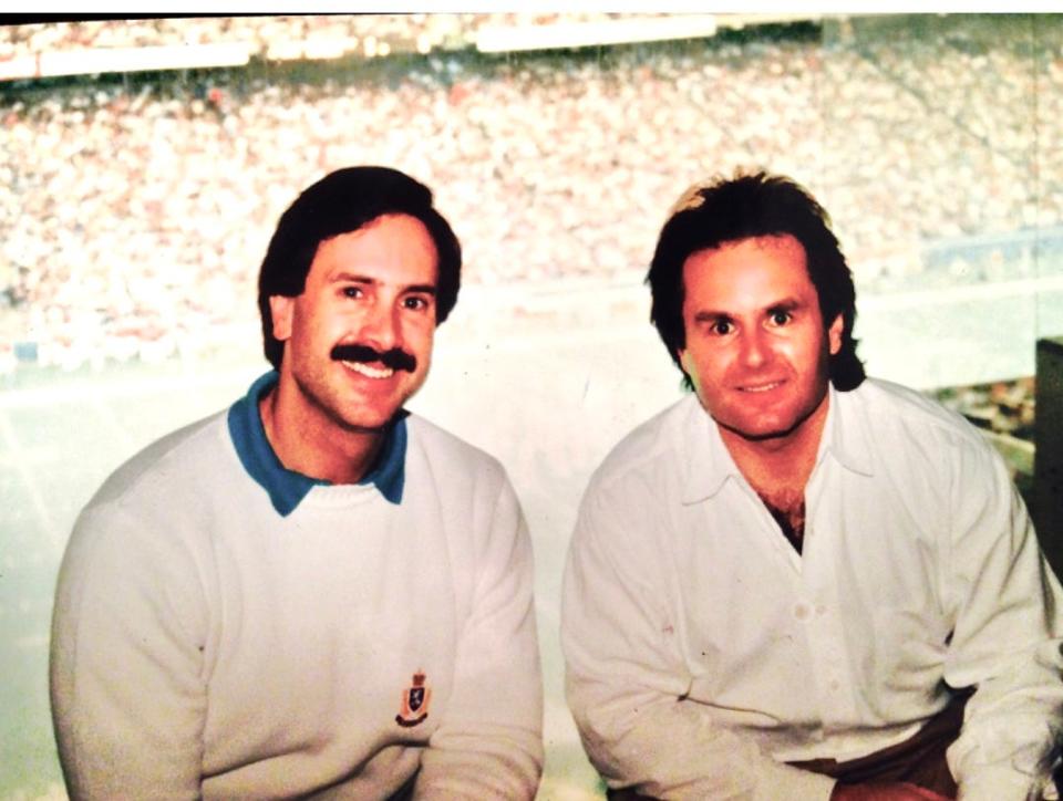 Oakland County Sheriff Mike Bouchard, left,  and his brother Jeff at the Pontiac Silverdome.