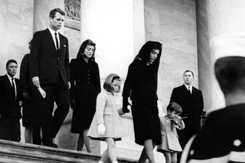 The Kennedy family departs the Capitol on November 25, 1963. From left to right, Peter Lawford, Attorney General Robert Kennedy, Patricia Kennedy Lawford, Caroline Kennedy, first lady Jacqueline Kennedy and John F. Kennedy Jr. Photo by Abbie Rowe/John F. Kennedy Presidential Library &amp Museum