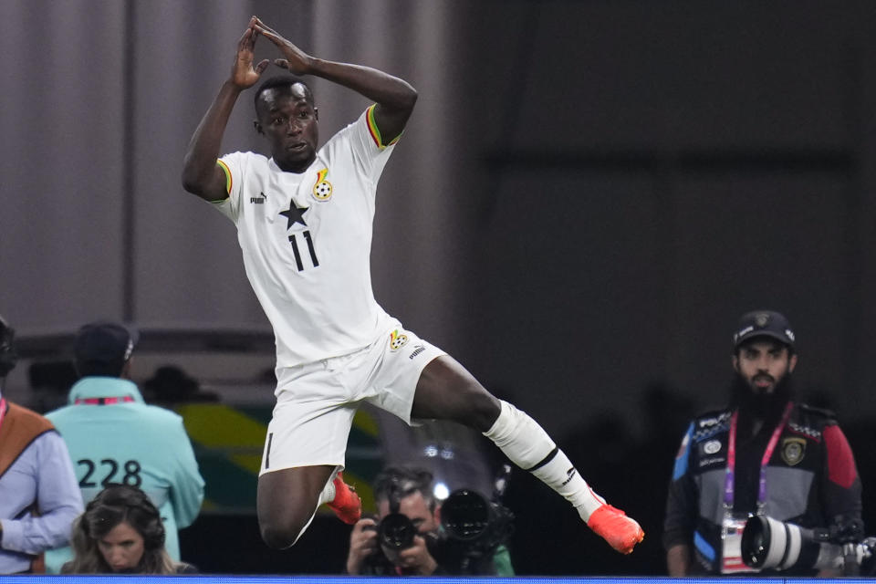 Ghana's Osman Bukari celebrates scoring his side's second goal against Portugal during a World Cup group H soccer match at the Stadium 974 in Doha, Qatar, Thursday, Nov. 24, 2022. (AP Photo/Manu Fernandez)