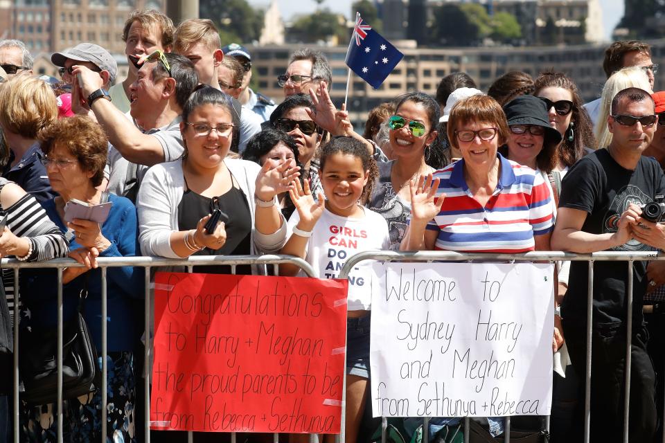 Meghan Markle and Prince Harry met a girl who looked just like a young Markle while in Sydney, Australia. Of course they broke royal protocol to take a pic.