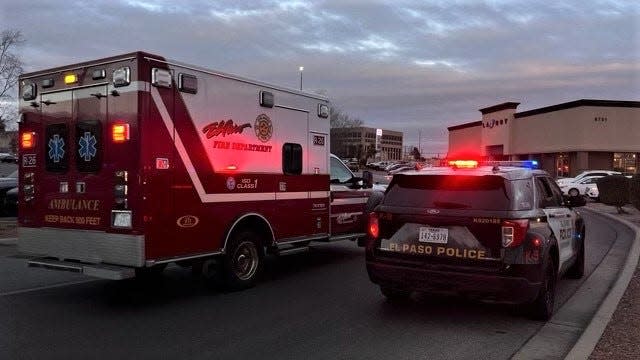 An El Paso Fire Department ambulance and a police vehicle are shown at Cielo Vista Mall after a shooting was reported at the food court on Wednesday, Feb. 15, 2023.