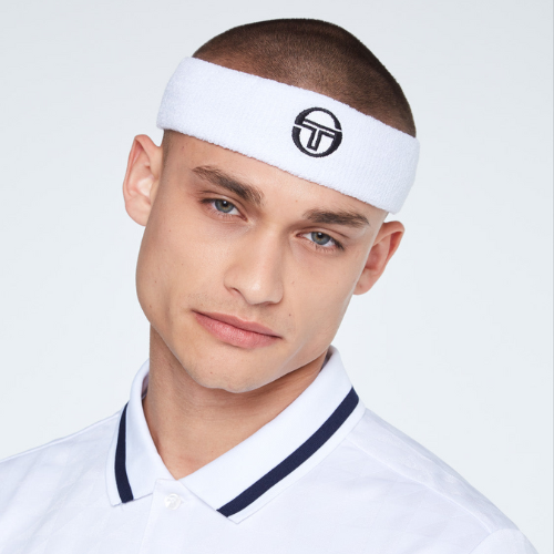 man wearing white sergio tacchini headband