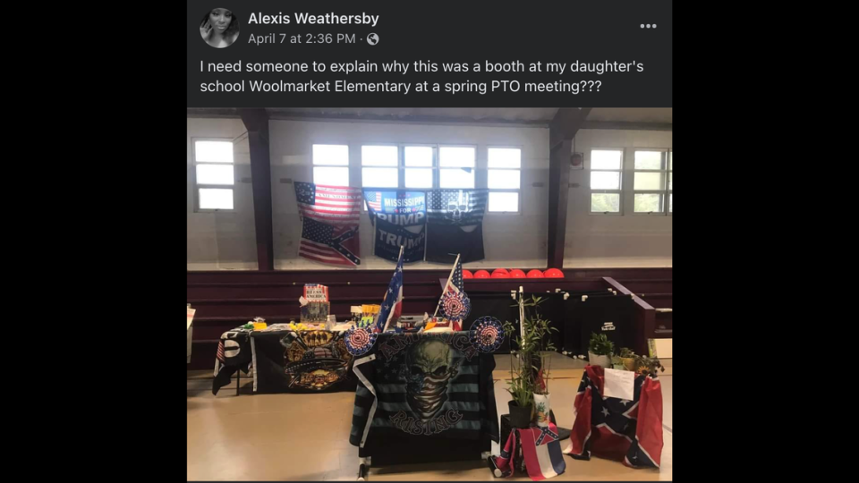 The “Flag Lady” was allowed to put up a booth of Confederate flags and flags supporting Donald Trump at a Woolmarket Elementary event.