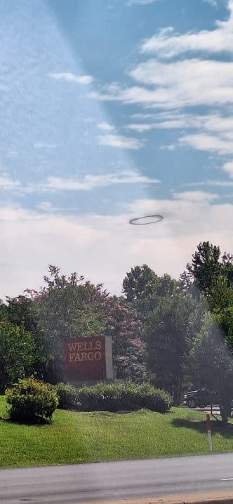 Mysterious Black Ring Captivates Residents in Williamsburg Sky