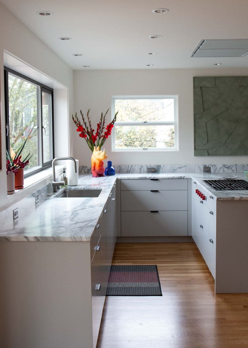 White marble countertop in newly renovated kitchen.